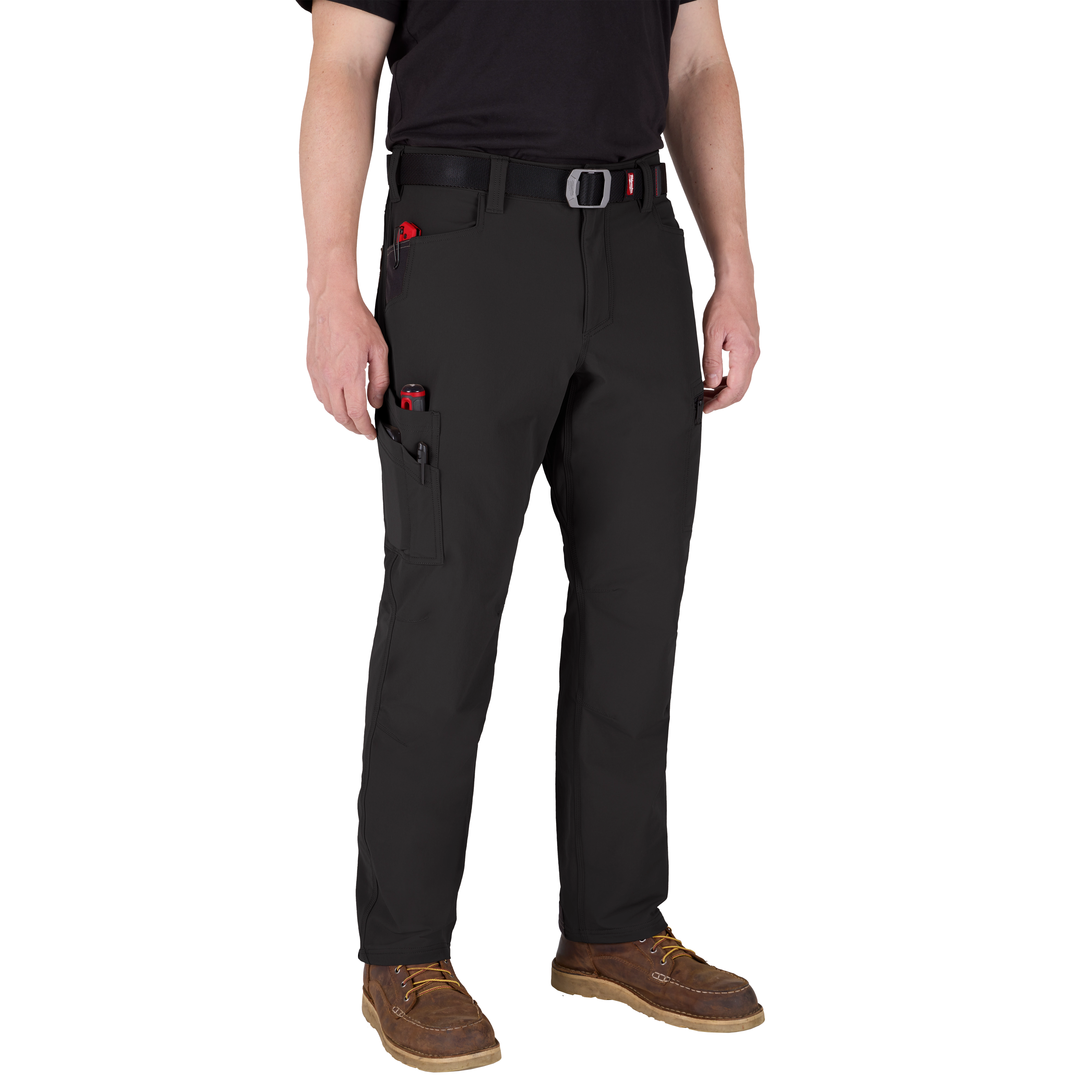 Man wearing black Milwaukee Tool work pants