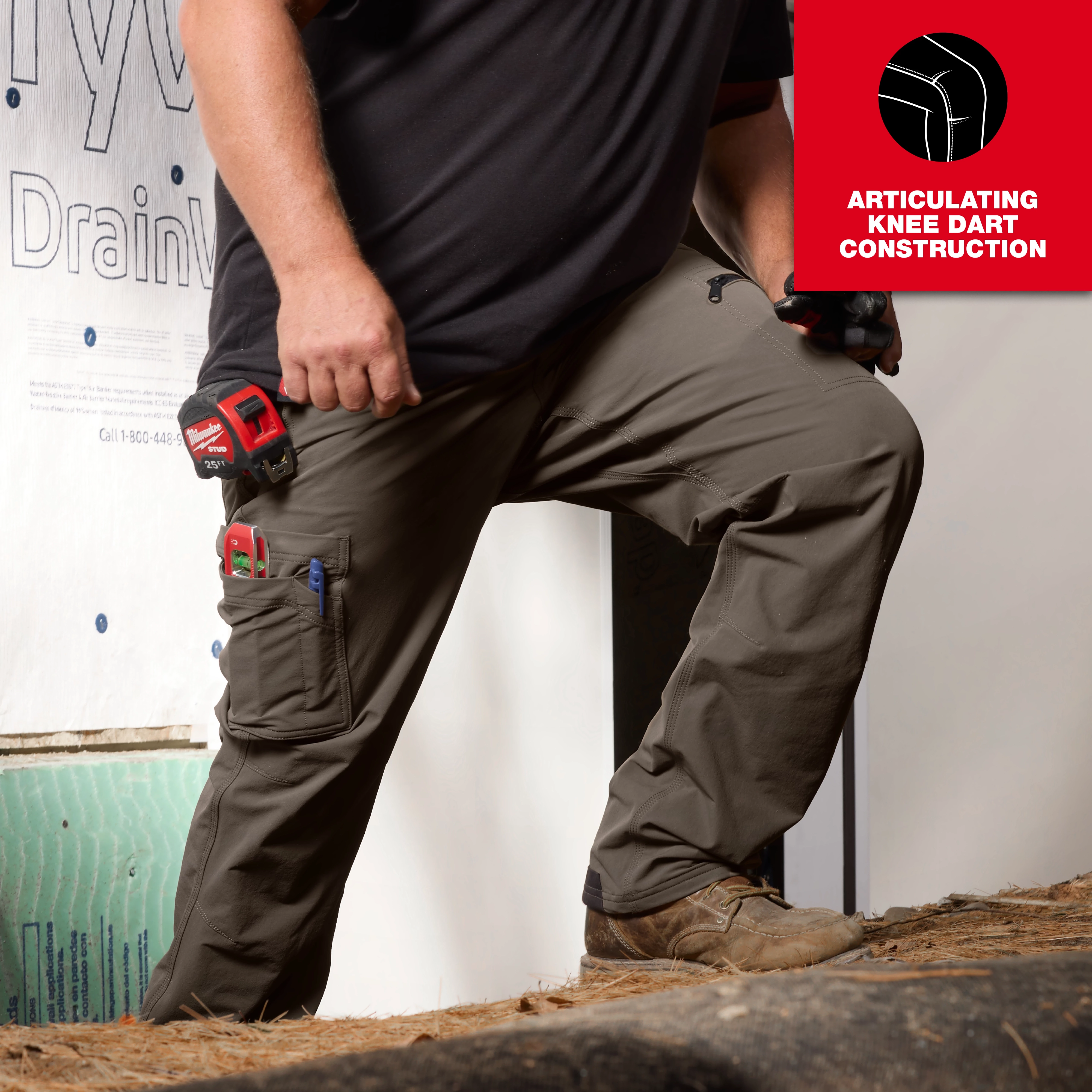 Image of a man wearing Milwaukee FREEFLEX™ Tech Pants on the jobsite