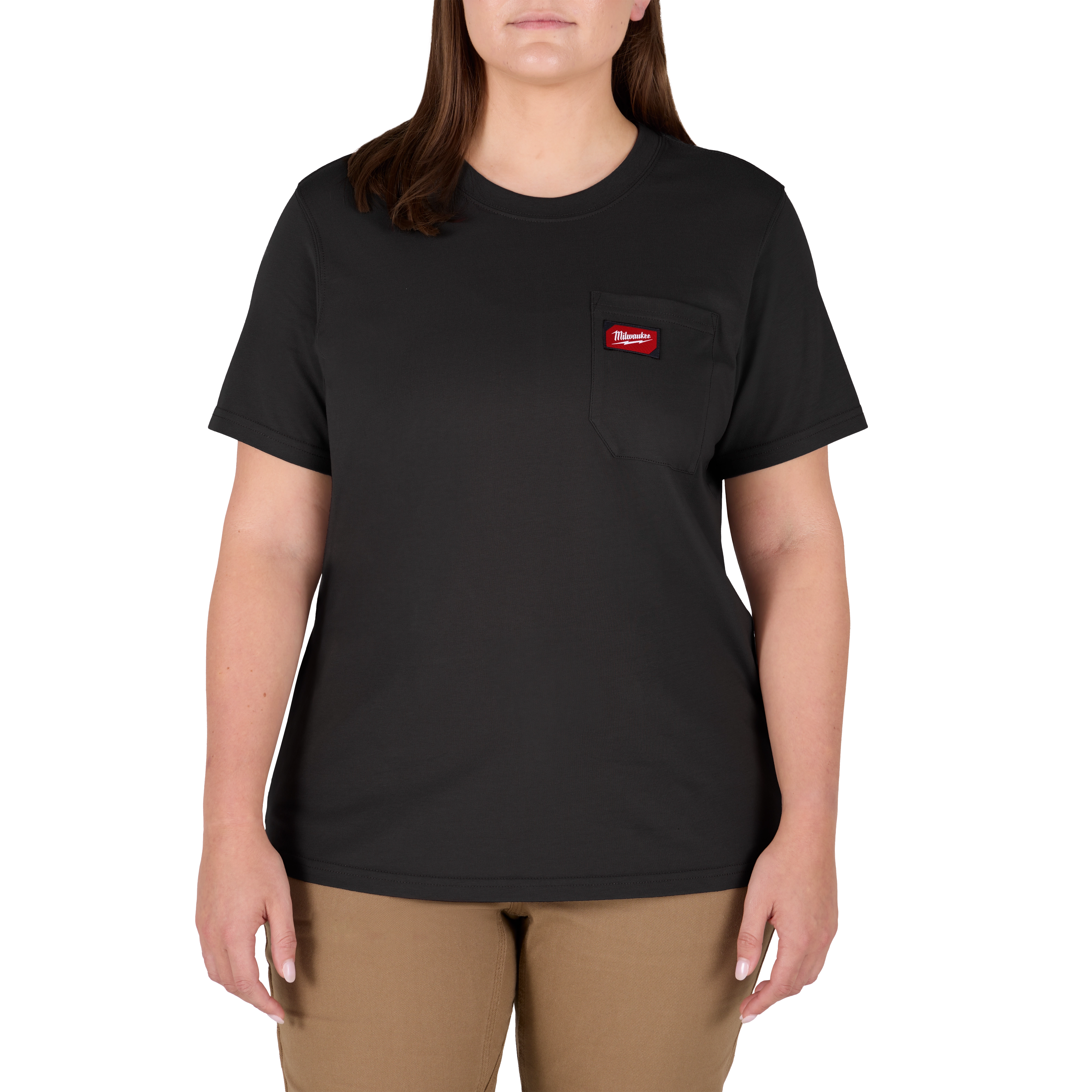 A person wearing the Women's GRIDIRON™ Pocket T-Shirt - Short Sleeve Black. The black t-shirt features a small pocket on the upper left side with a red tag. The person is also wearing beige pants.